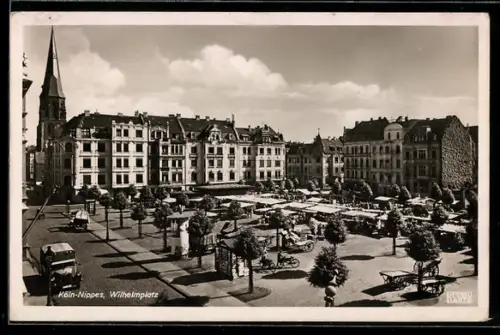 AK Köln-Nippes, Partie am Wilhelmplatz mit Kirche und Grünanlagen