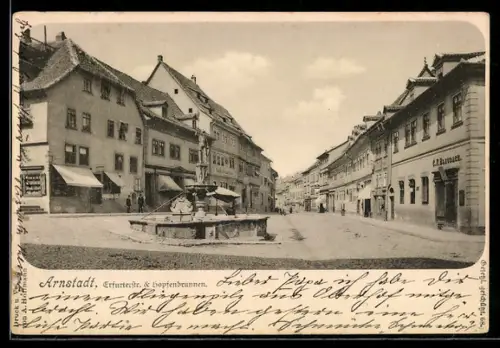 AK Arnstadt, Erfurterstrasse mit Geschäften & Hopfenbrunnen