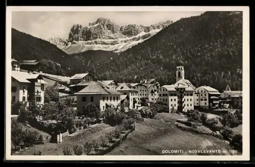 AK Nova Levante, Vista del paese con Dolomiti sullo sfondo
