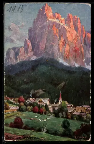 AK Seis am Schlern, Vista del villaggio con il maestoso massiccio montuoso al tramonto