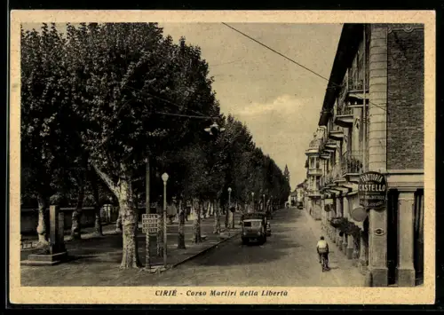 AK Ciriè, Corso Martiri della Libertà con alberi e veicoli