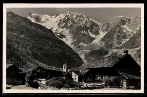AK Macugnaga, Pecetto e il Monte Rosa maestosi sullo sfondo delle case rustiche