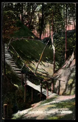 AK Bad Bückow, Waldpartie mit Teufelsbrücke