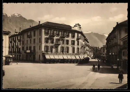 AK Domodossola, Via G. Marconi con Hotel Svizzero e montagne sullo sfondo