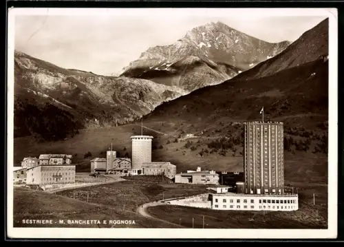 AK Sestriere, M. Banchetta e Rognosa, veduta panoramica con edifici e montagne sullo sfondo