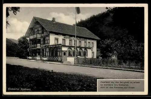 AK Herzberg a. H., Hotel zum Paradies in der Aussenansicht mit angrenzendem Wald, Inh. W. Puzicha