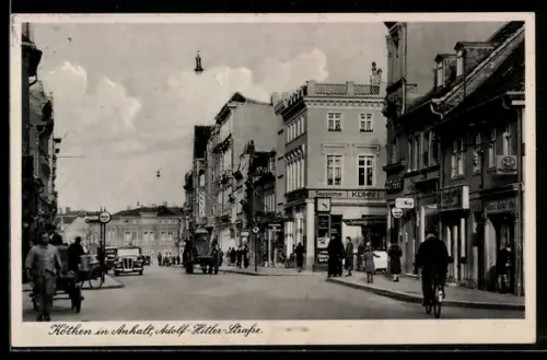 AK Köthen in Anhalt, Strasse mit Teppichgeschäft Kühn