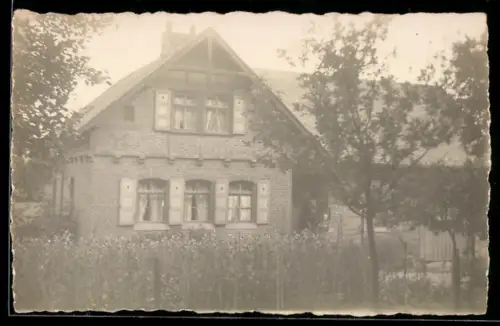 Foto-AK Usingen, Forsthaus mit Garten