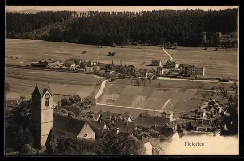 AK Pieterlen, Panorama mit Kirche, Dorf und Feldern
