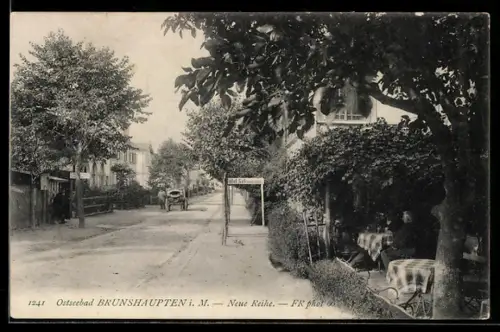 AK Brunshaupten, Neue Reihe mit Hotel Schwemer, Strassenpartie