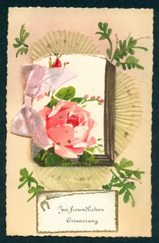 Oblaten-AK Mit einer Rose und einer Schleife verziertes Buch
