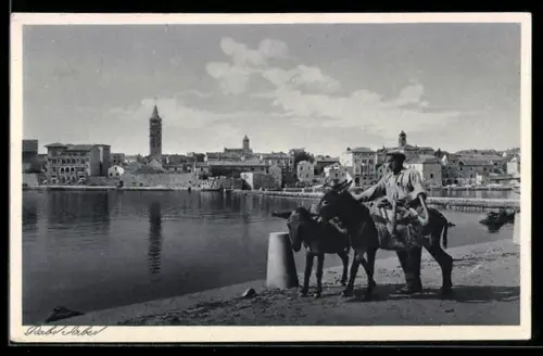 AK Rab / Arbe, Totalansicht mit Mann der einen Esel führt