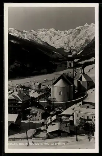 AK Colle Isarco sul Brennero, Ortsansicht im Winter gegen die Berge