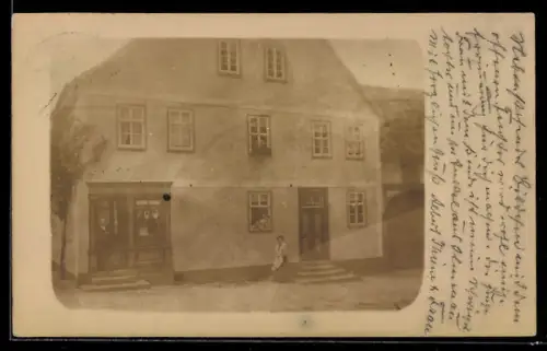 Foto-AK Remda, Geschäft und Haus von Albert Thiene im Jahr 1911