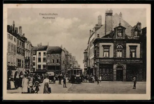 AK Diedenhofen, Marktplatz mit Strassenbahn, Kaufhaus Bazar, Uhrmacher Gebrüder Gierden