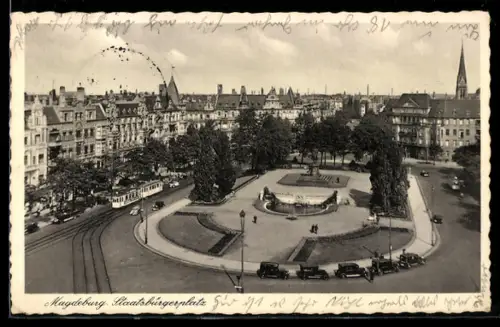 AK Magdeburg, Stadtbürgerplatz mit Strassenbahn und Denkmal aus der Vogelschau