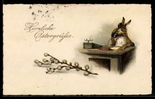 AK Osterhase nimmt einen Anruf am Schreibtisch entgegen