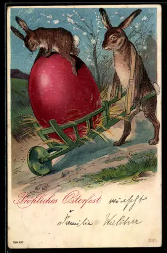 AK Osterhase schiebt einen Karren mit riesigem Osterei