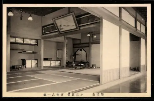 AK Niigata, Gästezimmer eines Ryokan mit Tatami und Irori