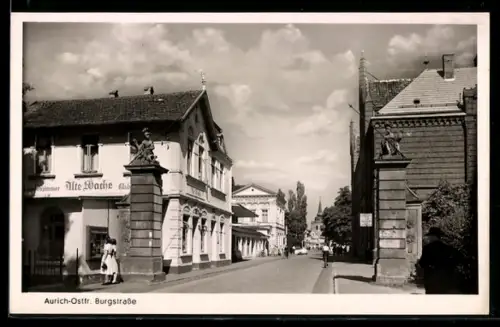 AK Aurich /Ostfr., Burgstrasse, Gasthaus Alte Wache, Figurensäulen, Turmgebäude