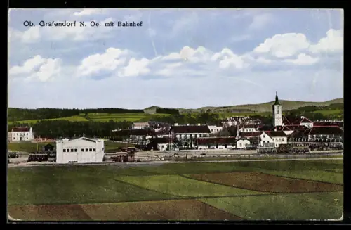 AK Ob. Grafendorf /N.-Oe., Teilansicht mit Bahnhof und Kirchturm