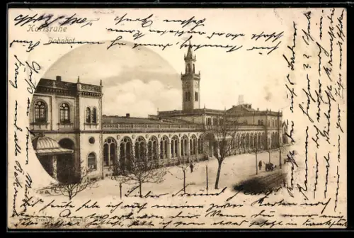 AK Karlsruhe, Partie am Bahnhof mit Turmuhr