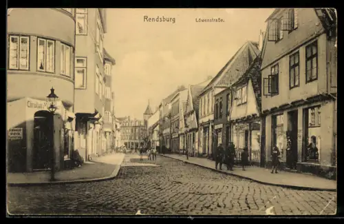 AK Rendsburg, Löwenstrasse mit Geschäften