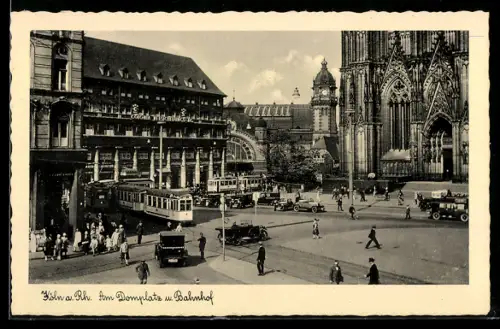 AK Köln am Rhein, Strassenbahn am Domplatz und Bahnhof