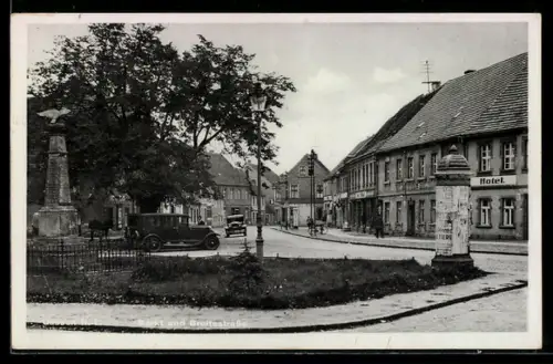 AK Gassen /N. L., Markt und Breitestrasse mit Hotel