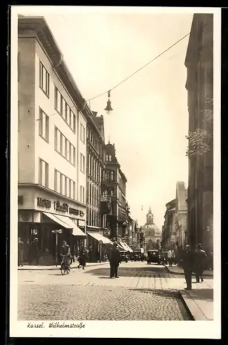 AK Kassel, Wilhelmstrasse mit Autos und Geschäften