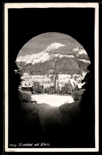 AK Kitzbühel, Kirche mit Horn im Winter