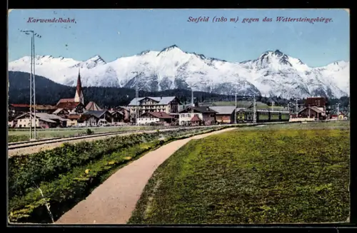 AK Seefeld, Bahnhofsgelände mit Karwendelbahn und Blick auf das Wettersteingebirge