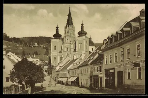 AK Mariazell, Strassenpartie mit Restaurant Rudolf Mayreder und Kirche