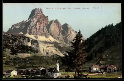 AK Corvara, Vista sul Sass Songher e paesaggio alpino con chiesa e case
