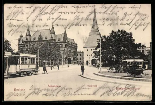 AK Rostock, Alexandrinenstrasse mit Ständehaus, Steintor und Strassenbahn