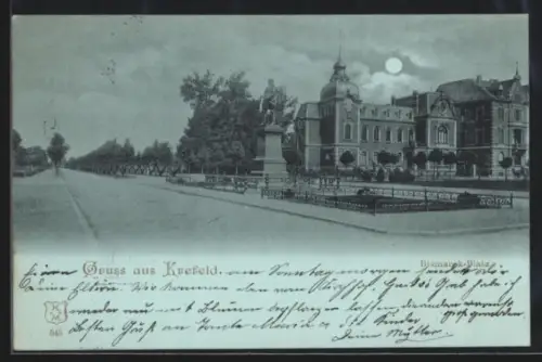 Mondschein-AK Krefeld, Bismarck-Platz mit Denkmal