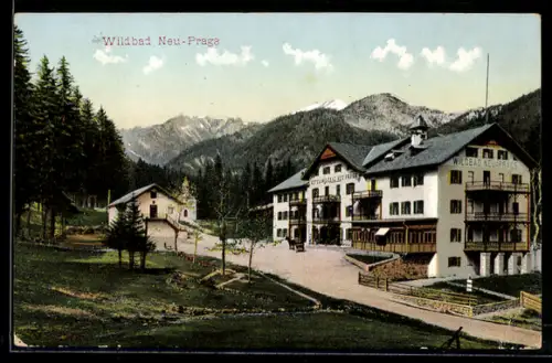 AK Neu-Prags, Hotel Wildbad Neu-Prags mit Bergpanorama im Hintergrund