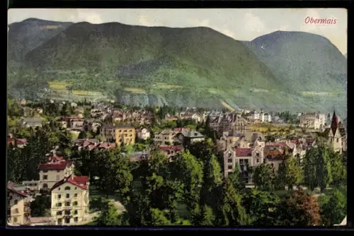 AK Obermais, Vista panoramica della città con montagne sullo sfondo