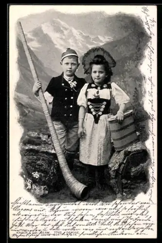 AK junge Schweizer in Tracht mit Alphorn