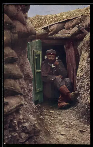 AK Soldat im Schützengraben mit einem Telefon