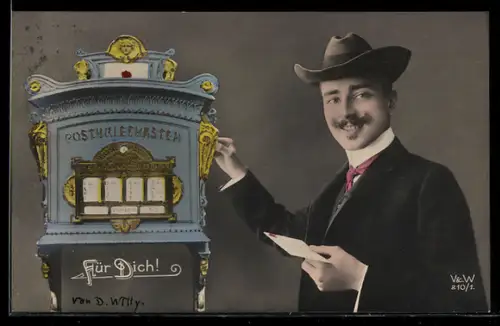 AK Junger Herr wirft am Postbriefkasten Brief ein