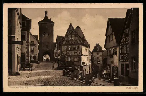 AK Rothenburg o. T., Plönlein, Stadttor, Fachwerkhäuser, Strassenpartie