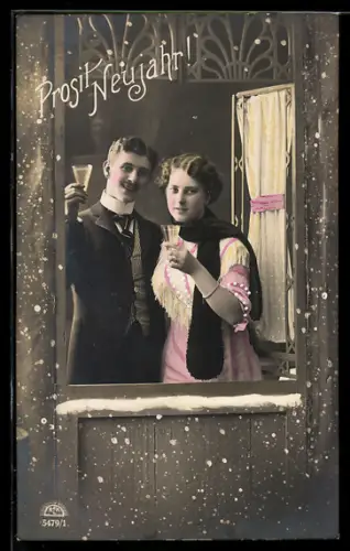 Foto-AK R & K / L Nr. 5479/1: Junges Paar mit Sektgläsern, Neujahrsgruss