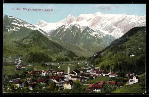 AK Schruns, Ortsansicht mit Gebirgspanorama