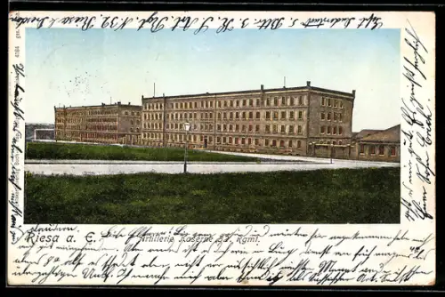 Goldfenster-AK Riesa a. E., Artillerie-Kaserne 32. Regiment mit leuchtenden Fenstern
