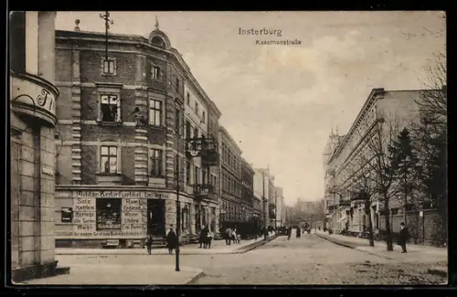 AK Insterburg, Kasernenstrasse mit Militär-Bedarfsartikel-Geschäft
