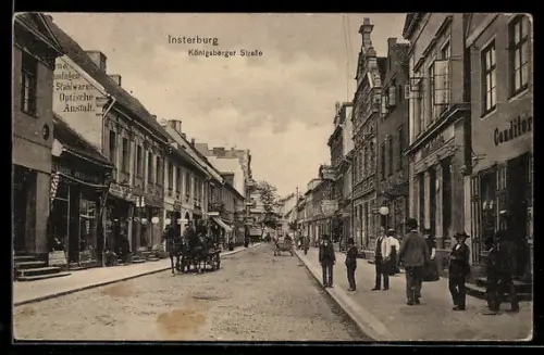 AK Insterburg, Königsberger Strasse mit Geschäften