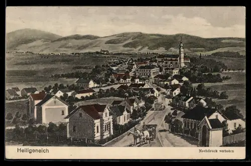 AK Atzenbrugg, Heiligeneich, Totalansicht mit Strasse, Turm, Fuhrwerken u. Berglandschaft