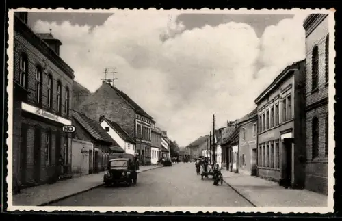 AK Lübben, Gubener Vorstadt, Strassenpartie mit Geschäften