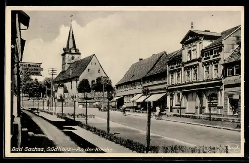 AK Bad Sachsa /Südharz, Strassenpartie mit Geschäften und Kirche
